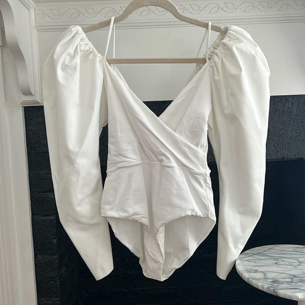 Maygel Coronel white puffed sleeve bathing suit body suit